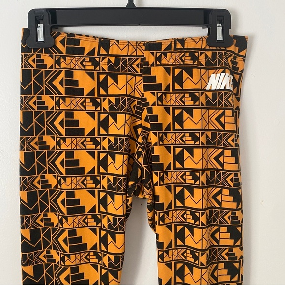 Nike Women’s Leggings Yoga Pant Aztec Print Orange & Black Boho Western Fall M - Picture 1 of 9